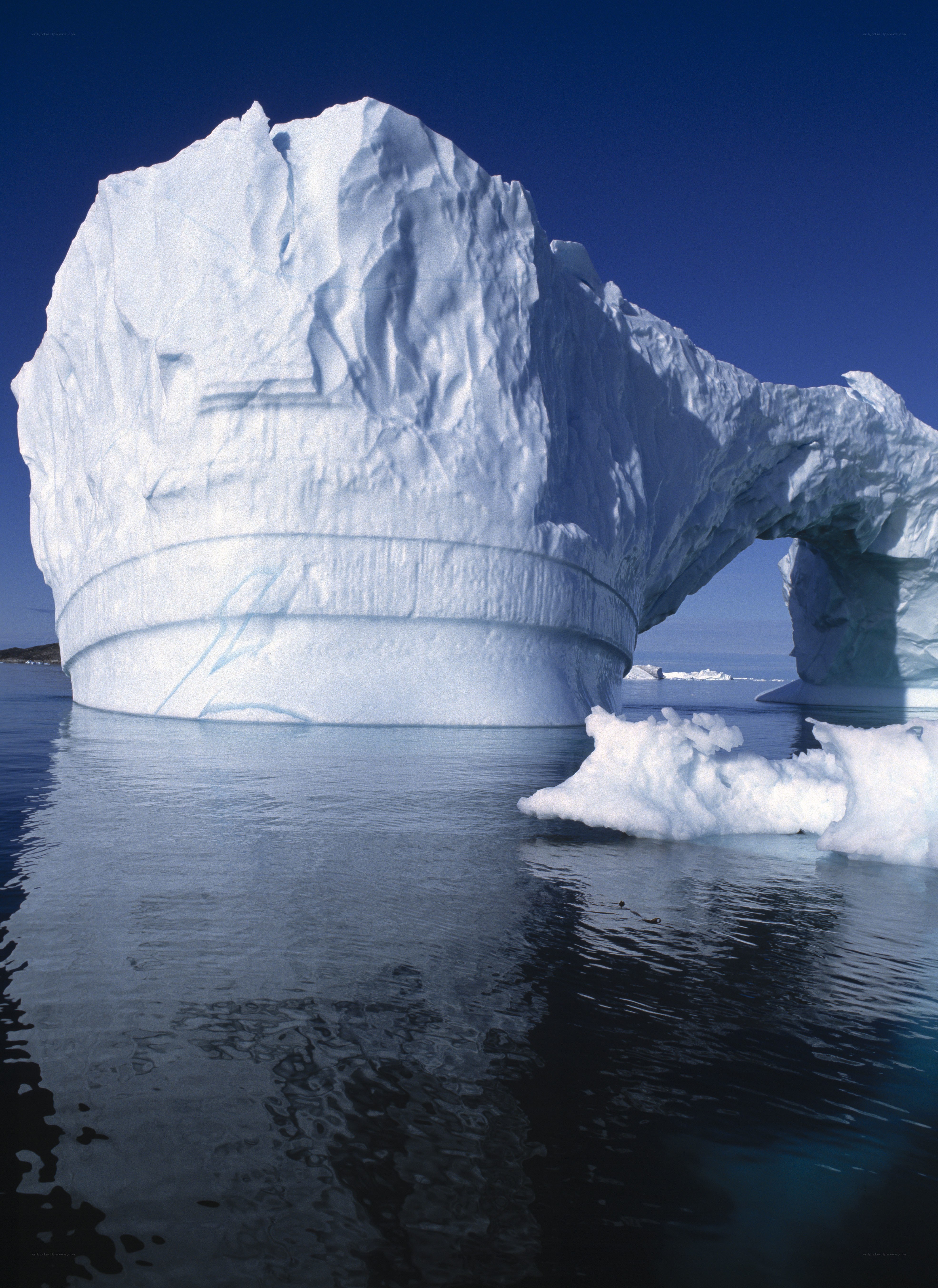 Iceberg with natural arch