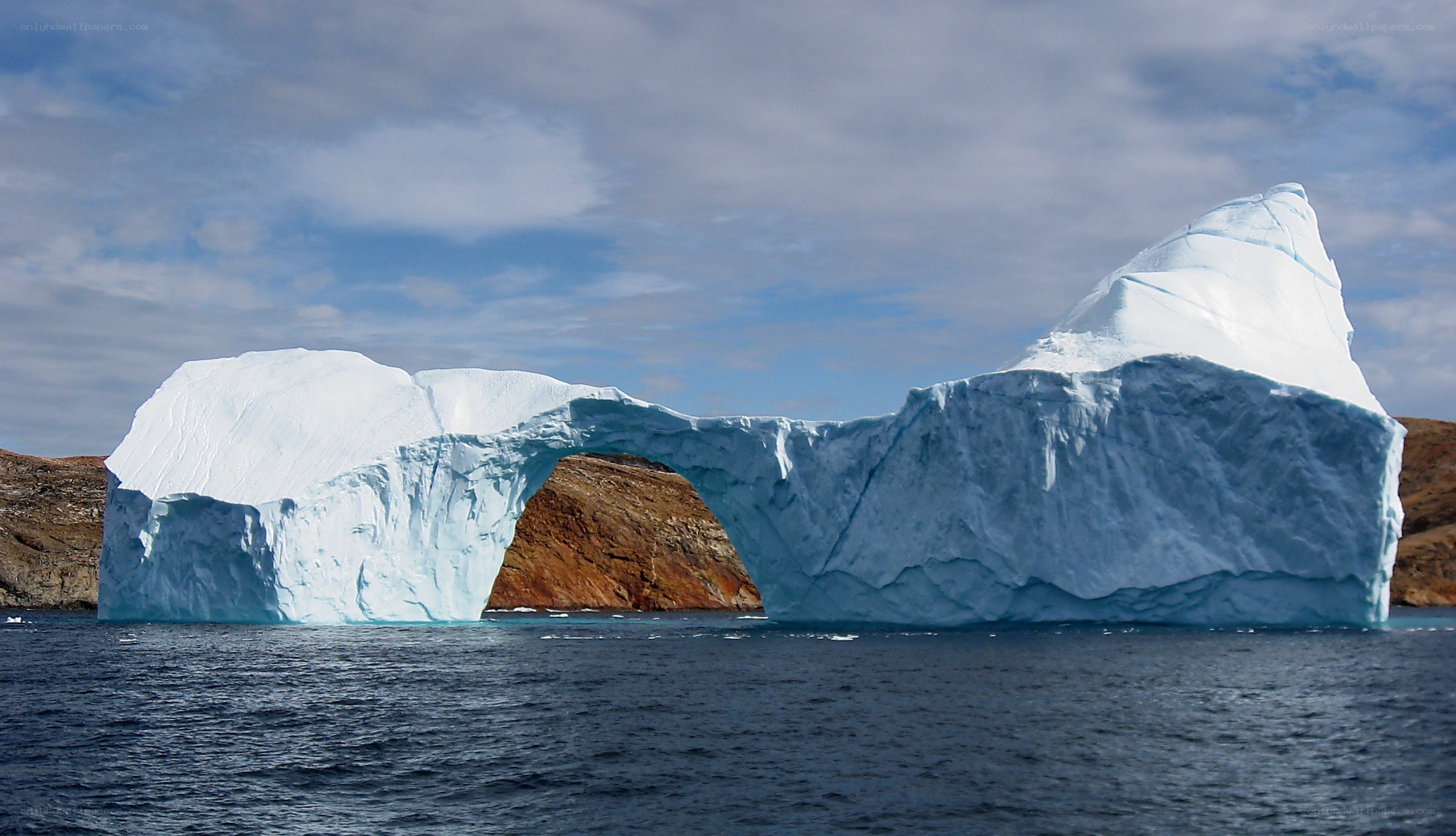 Iceberg with natural arch