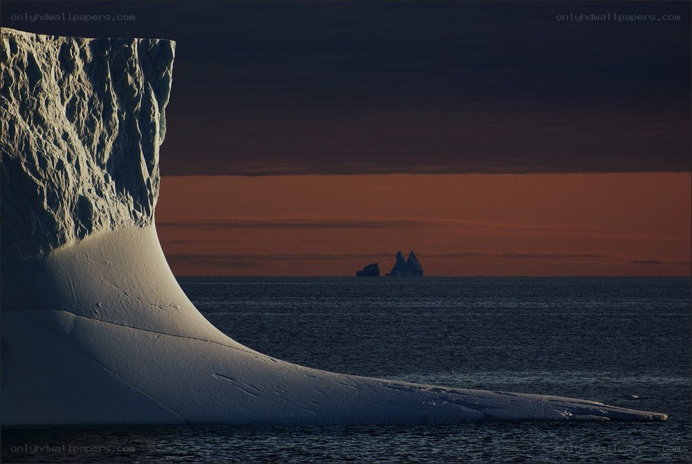 Icebergs at sunset