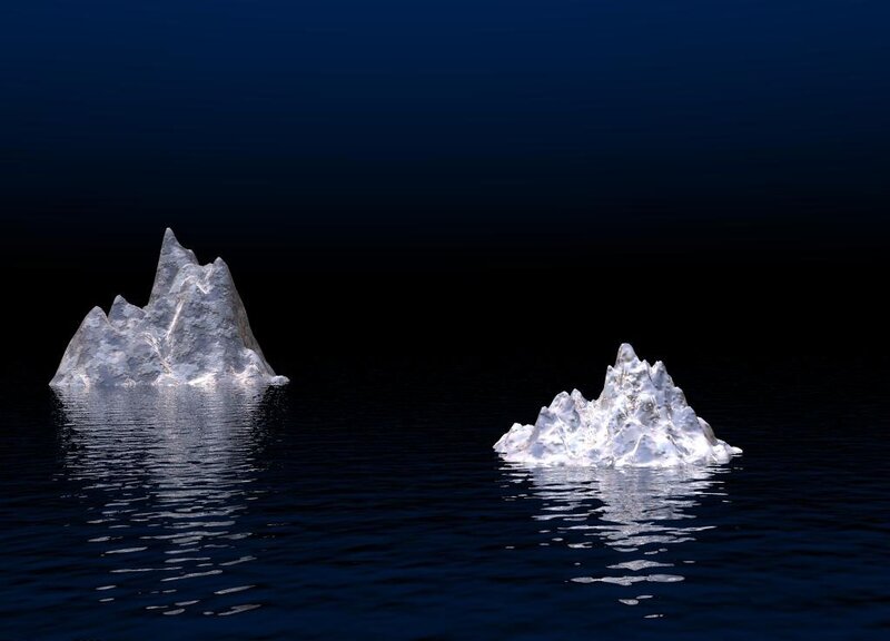 icebergs floating in dark water