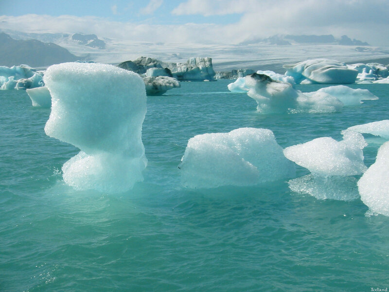 Icebergs floating in turquoise water