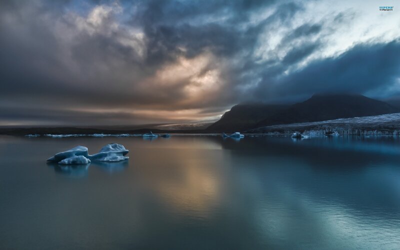 Icebergs in a calm fjord