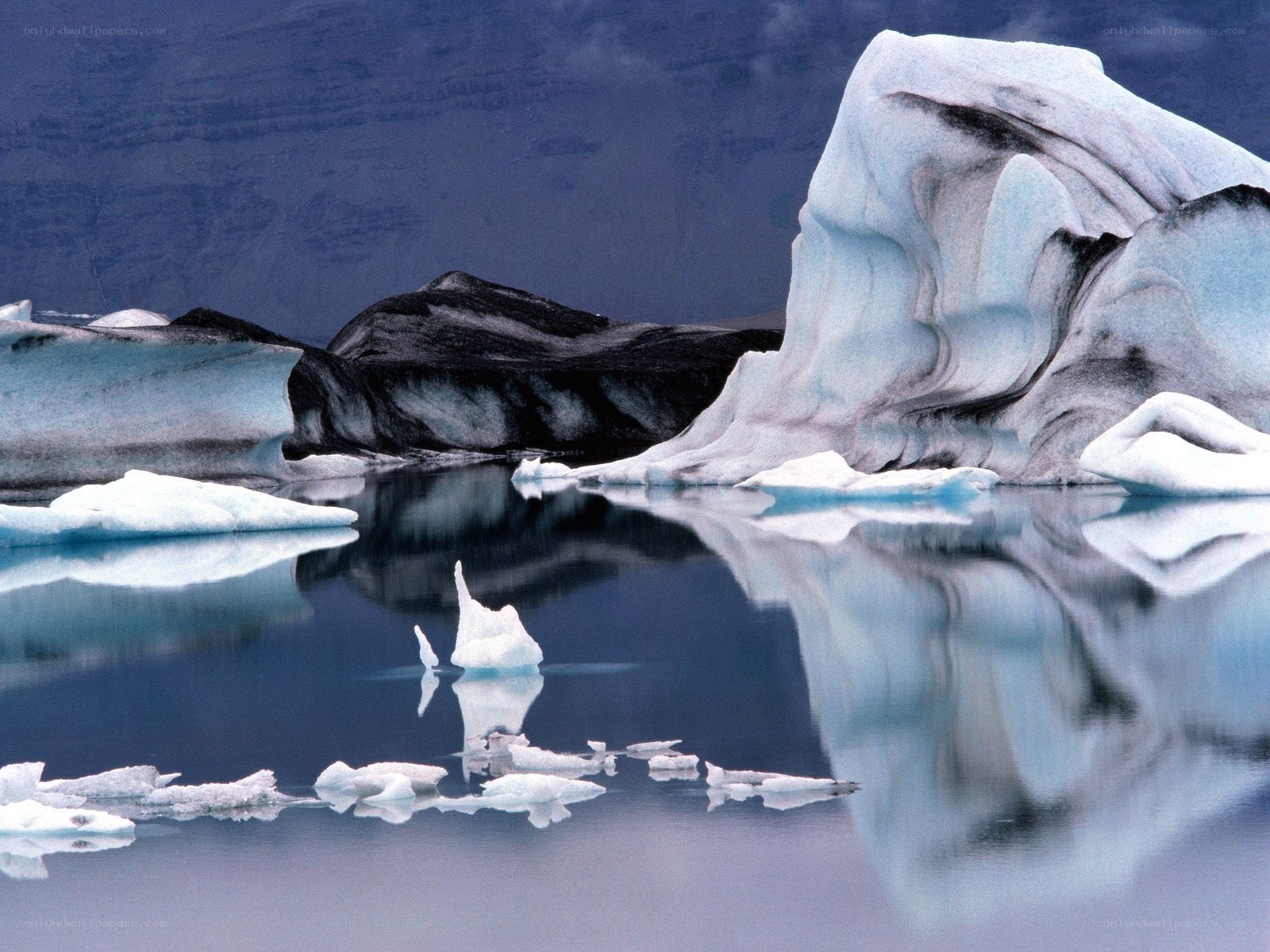 Icebergs in a calm lagoon