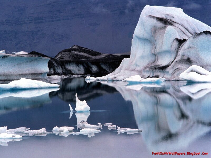 Icebergs in a calm lagoon