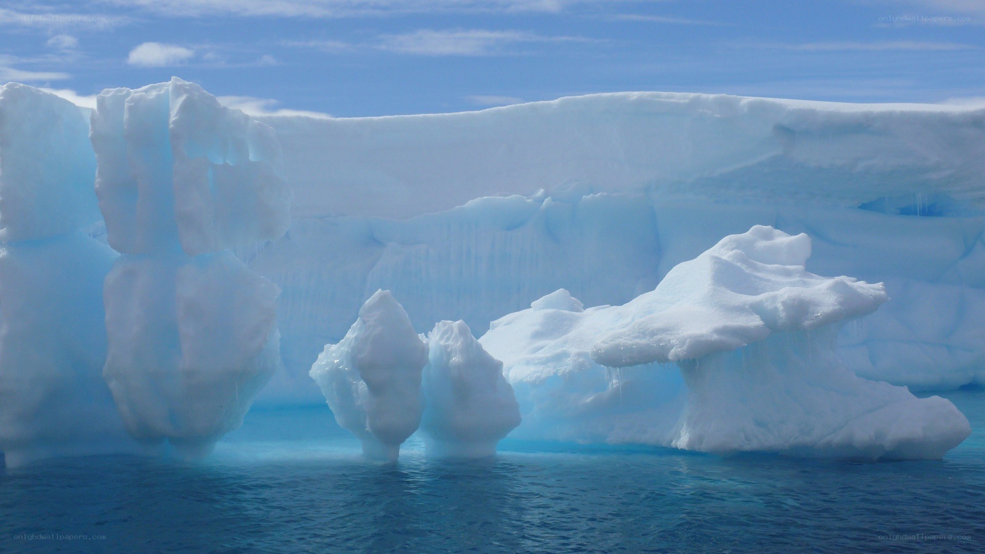 Icebergs in blue water