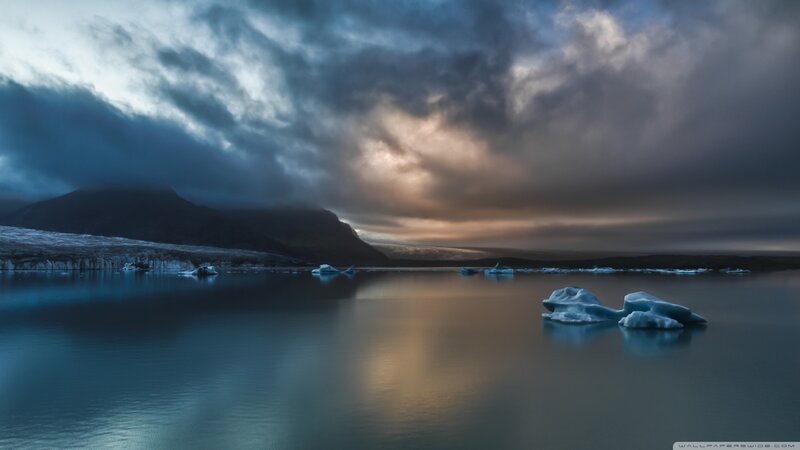 Icebergs in Glacial Lagoon — Blue, Dramatic, Sunset, Photograph, Mountain, Clouds