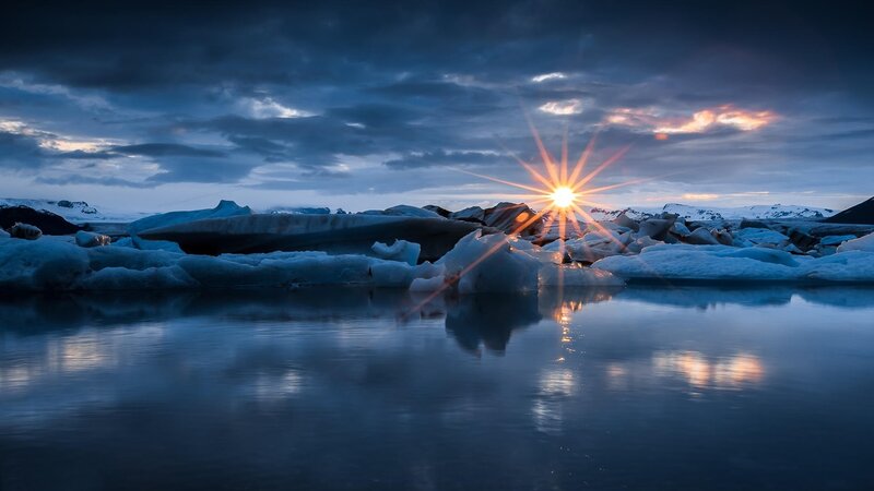 Icebergs in Glacial Lagoon — Blue, Dramatic, Sunset, Photograph, Sun