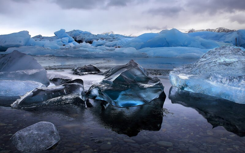 Icebergs in Glacial Lagoon — Blue, Dramatic, Winter, Photograph