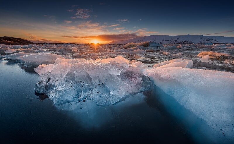 Icebergs in Glacial Lagoon — Blue, Serene, Sunset