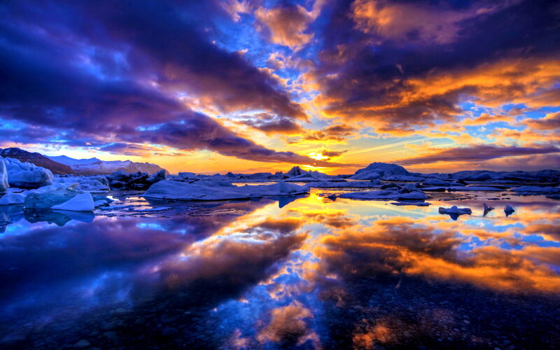 Icebergs in Lagoon — Blue, Dramatic, Sunset