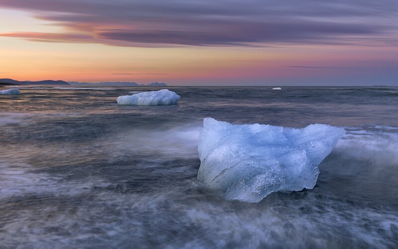 Icebergs in Ocean — Blue, Serene, Sunset, Photograph, Sky, Mountains