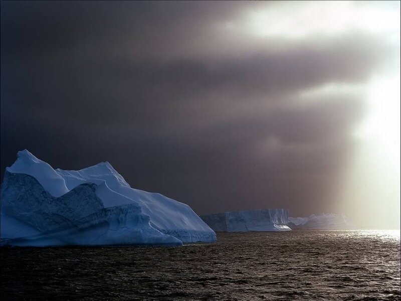 Icebergs in stormy sea