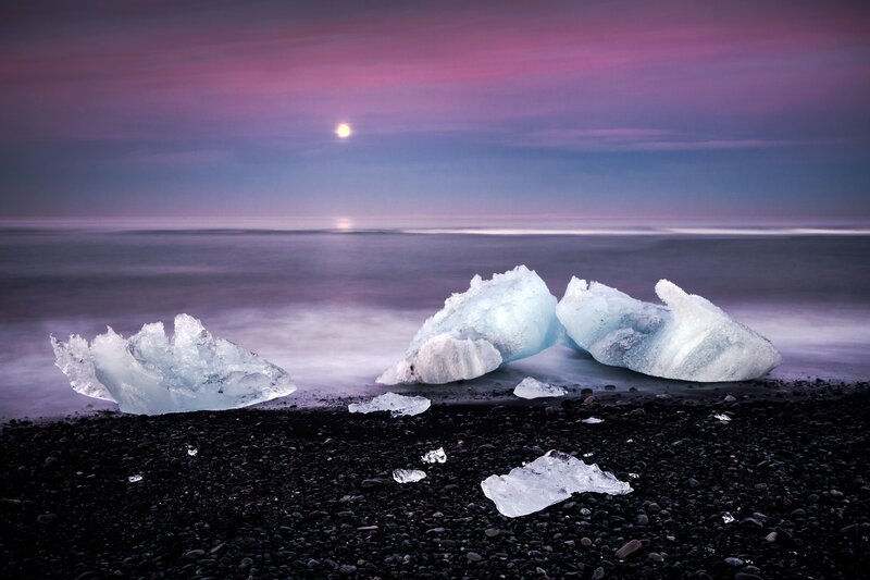Icebergs on a black sand beach