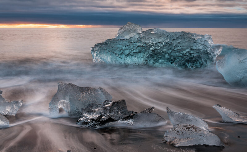 Icebergs on Black Sand Beach — Blue