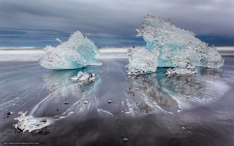 Icebergs on black sand beach