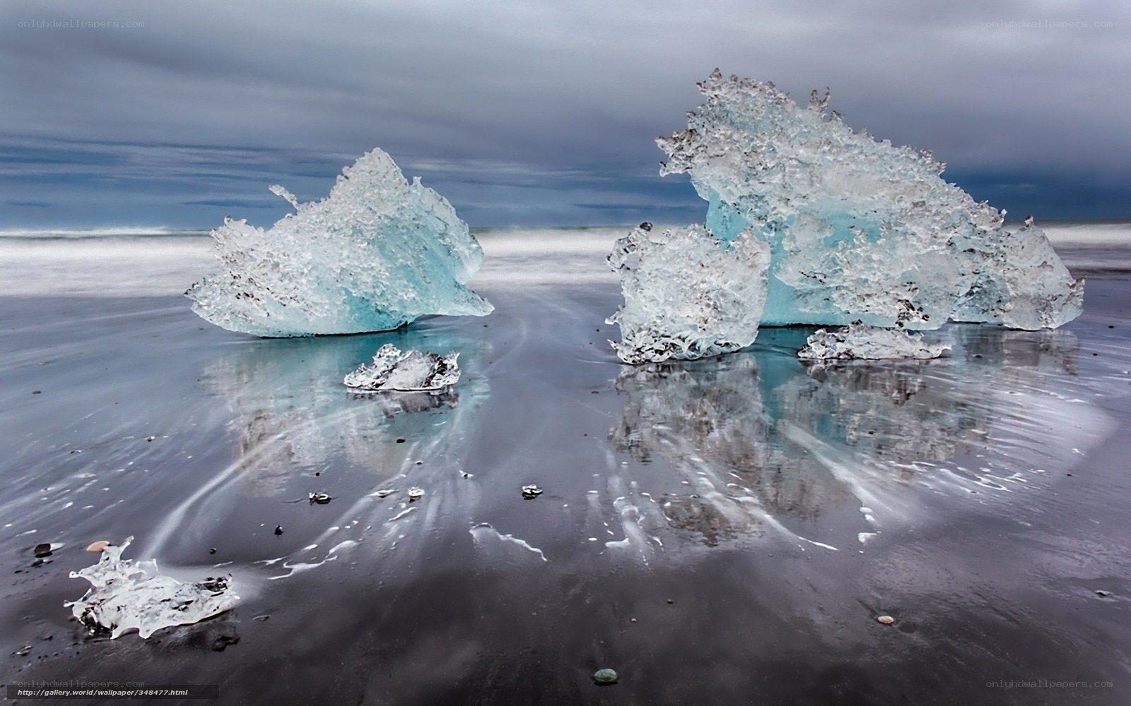 Icebergs on black sand beach