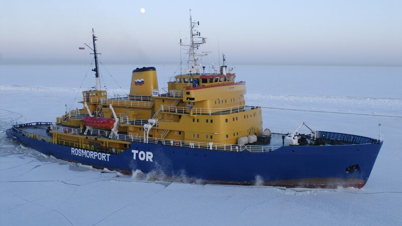 Icebreaker ship in frozen sea