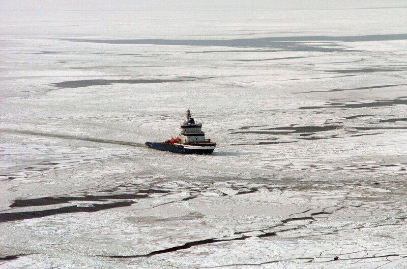 Icebreaker ship in frozen sea