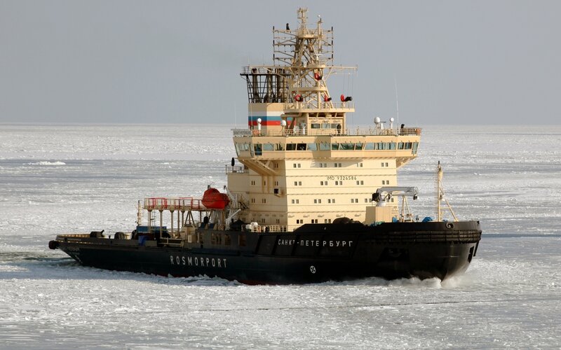 Icebreaker ship in frozen sea