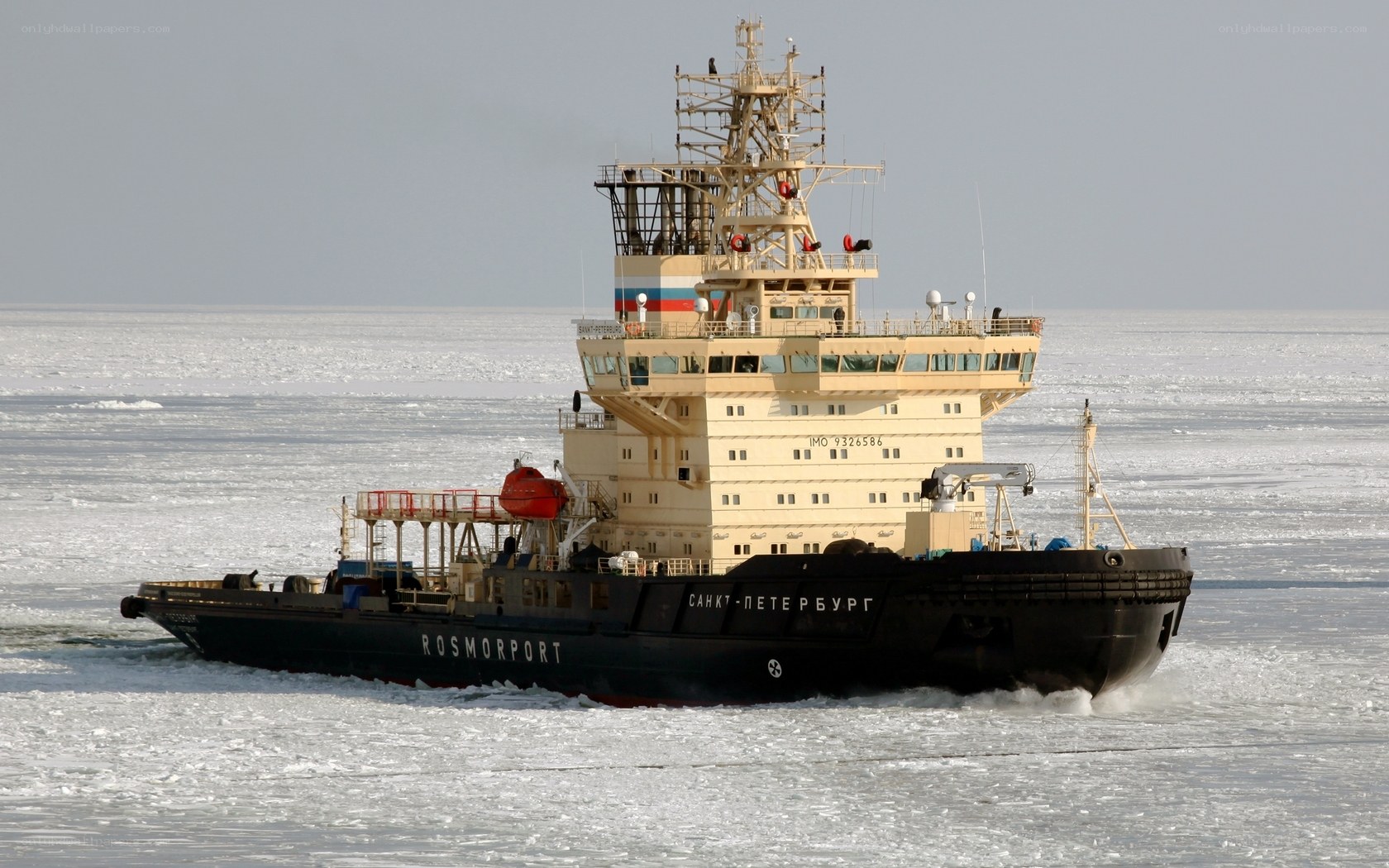 Icebreaker ship in frozen sea