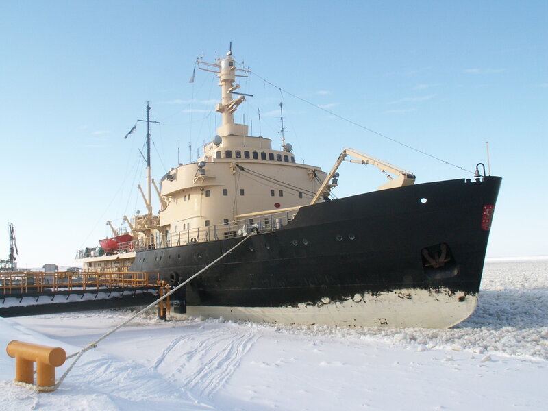 icebreaker ship in snowy port