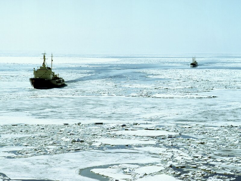 Icebreaking ships in frozen sea