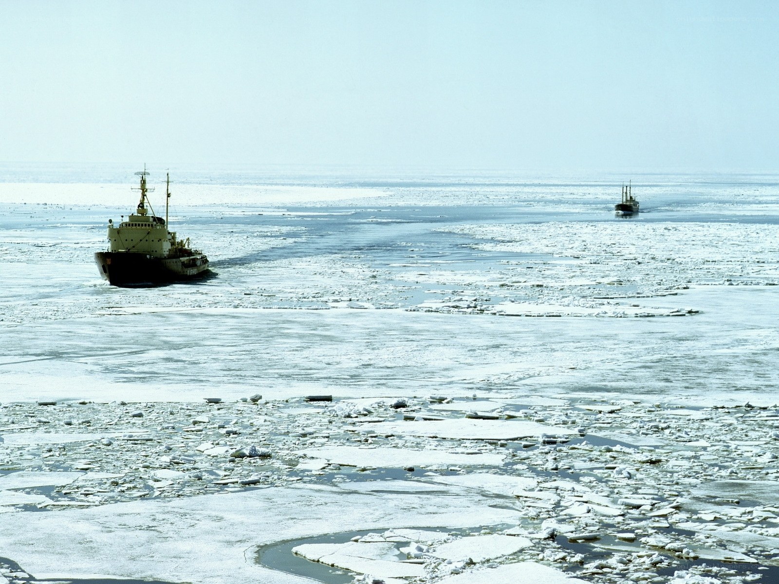 Icebreaking ships in frozen sea