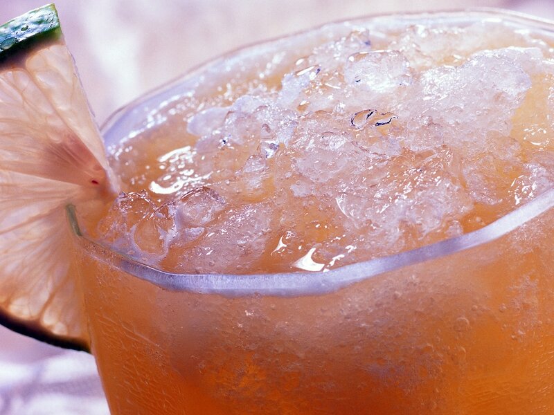 iced drink with lime wedge