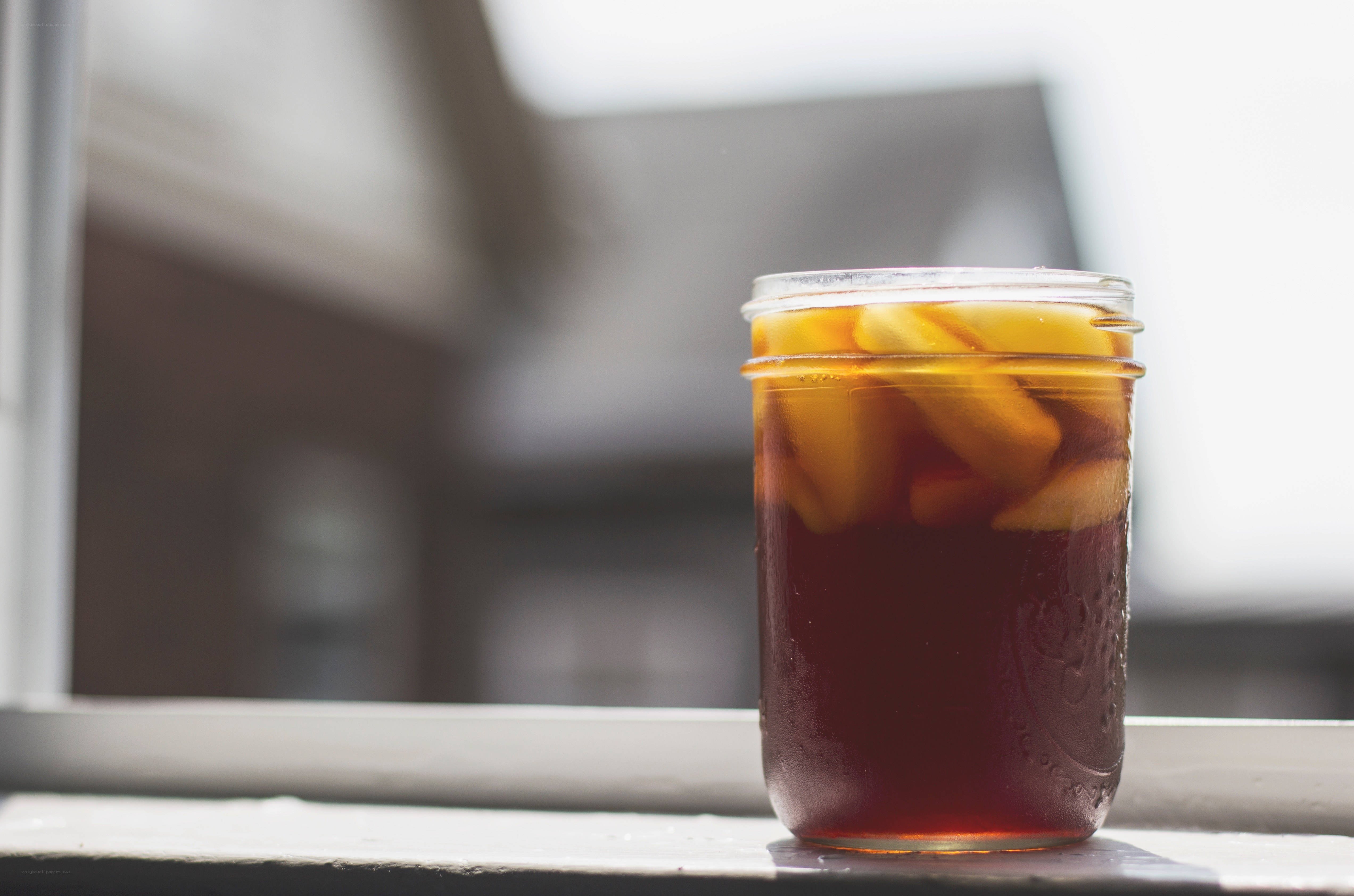 iced tea with lemon in a jar