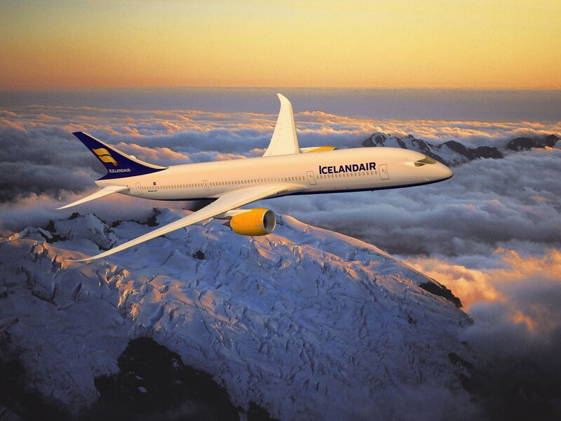 Icelandair plane over snowy mountains