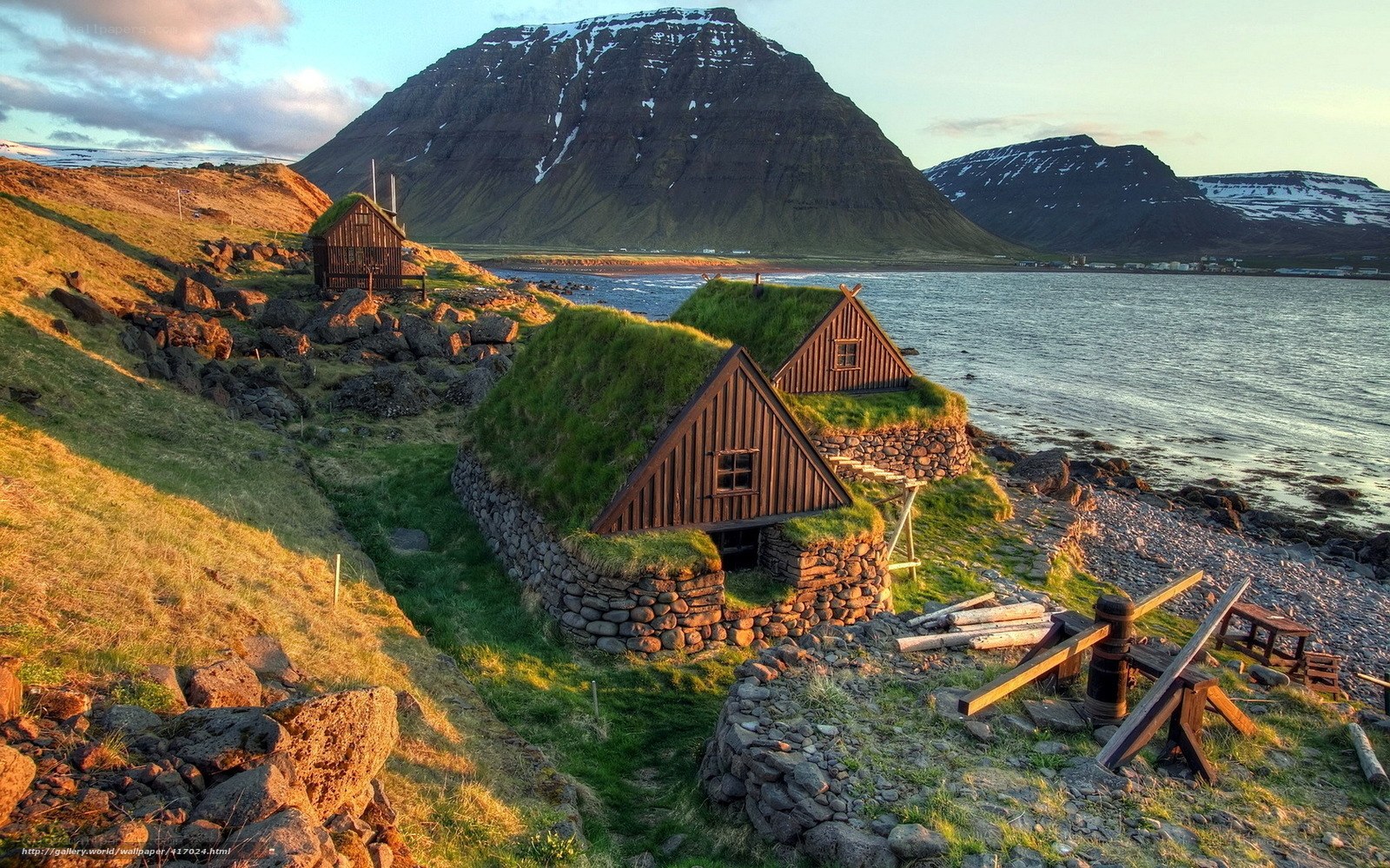 Icelandic turf houses by the sea