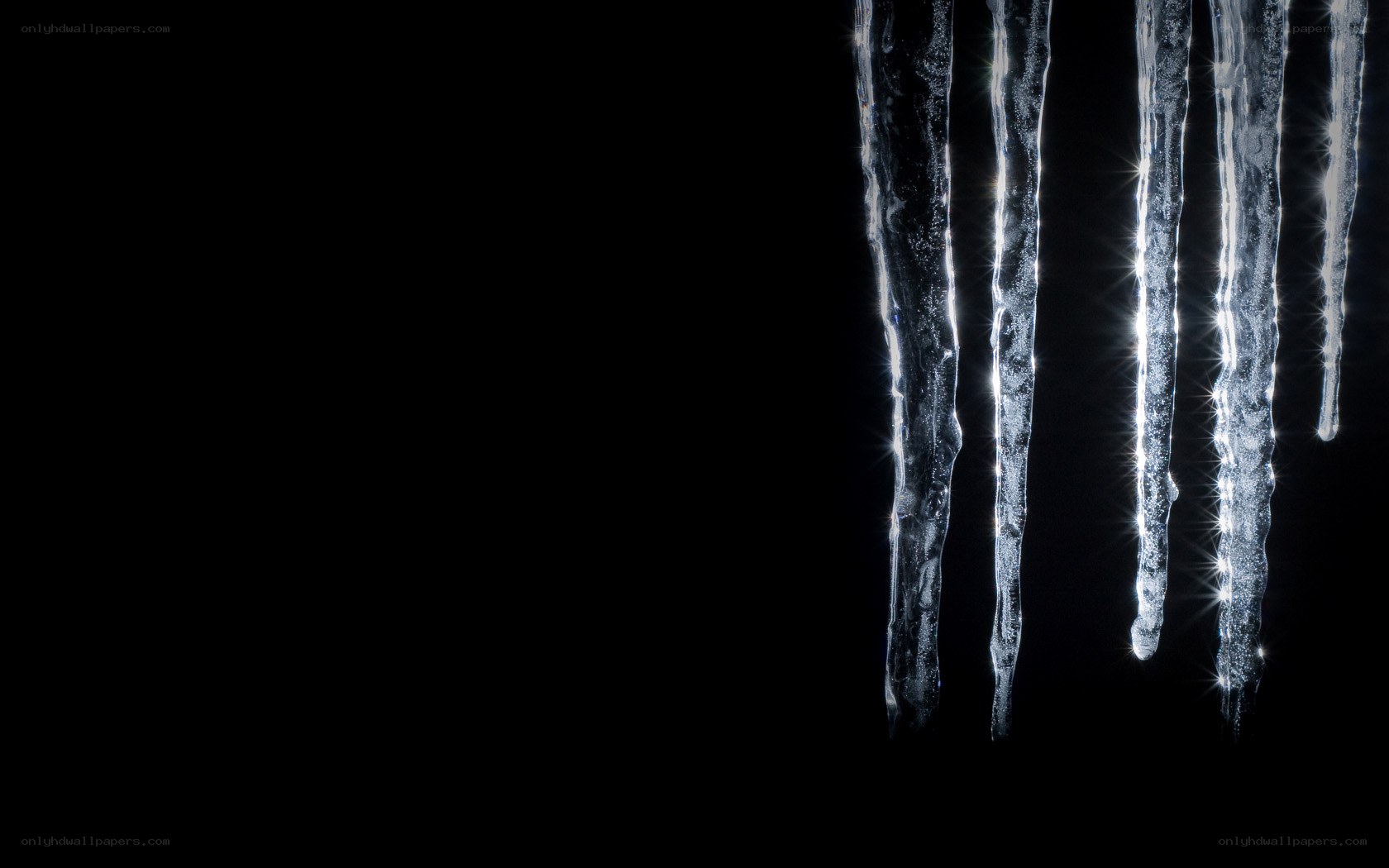 Icicles glowing in darkness