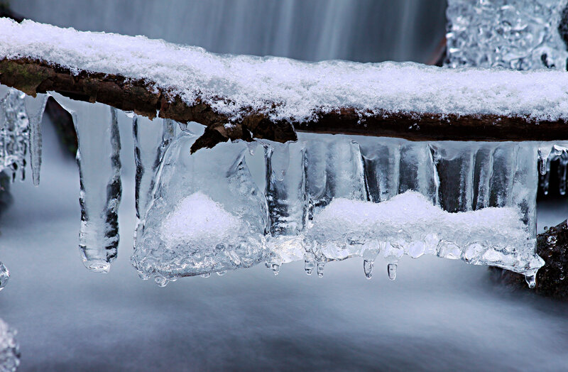 Icicles hanging from a branch