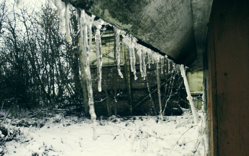 Icicles hanging from a bridge