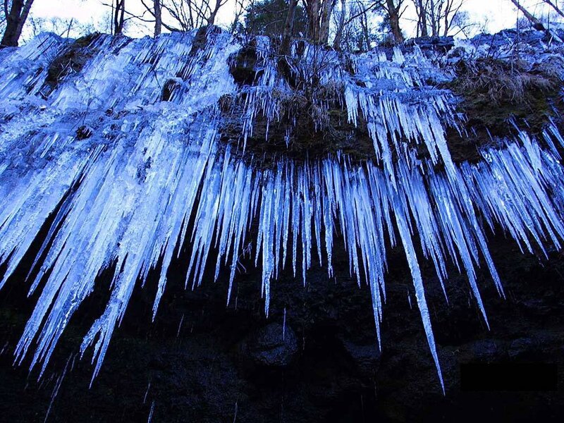Icicles on a rocky cliff