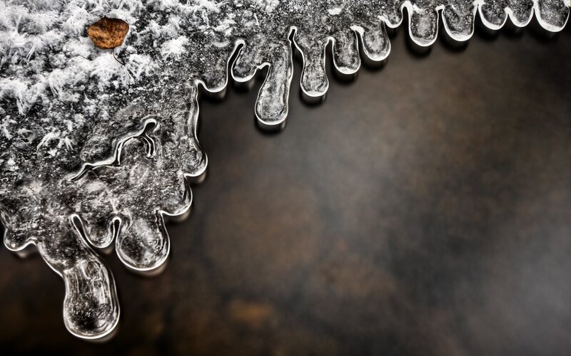 Icicles on Frozen Surface