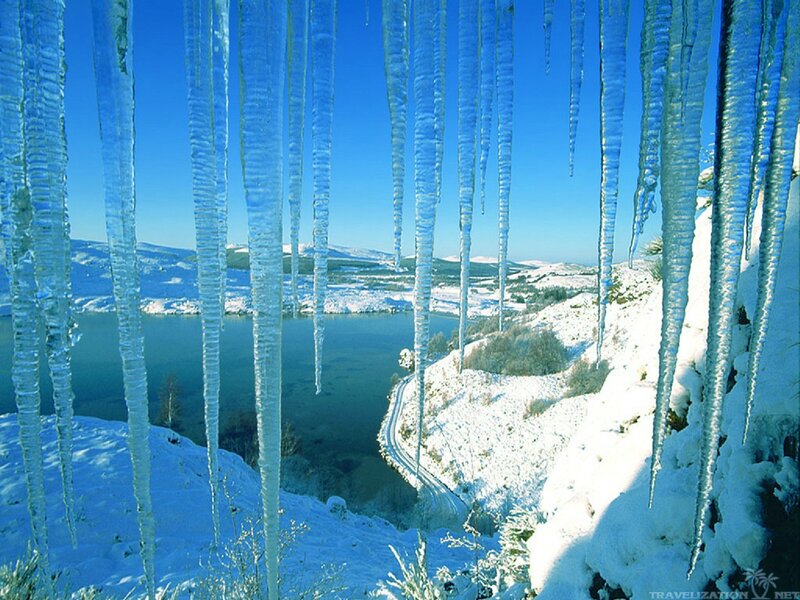 Icicles over Snowy Landscape — Blue