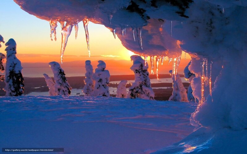 Icy cave at sunset