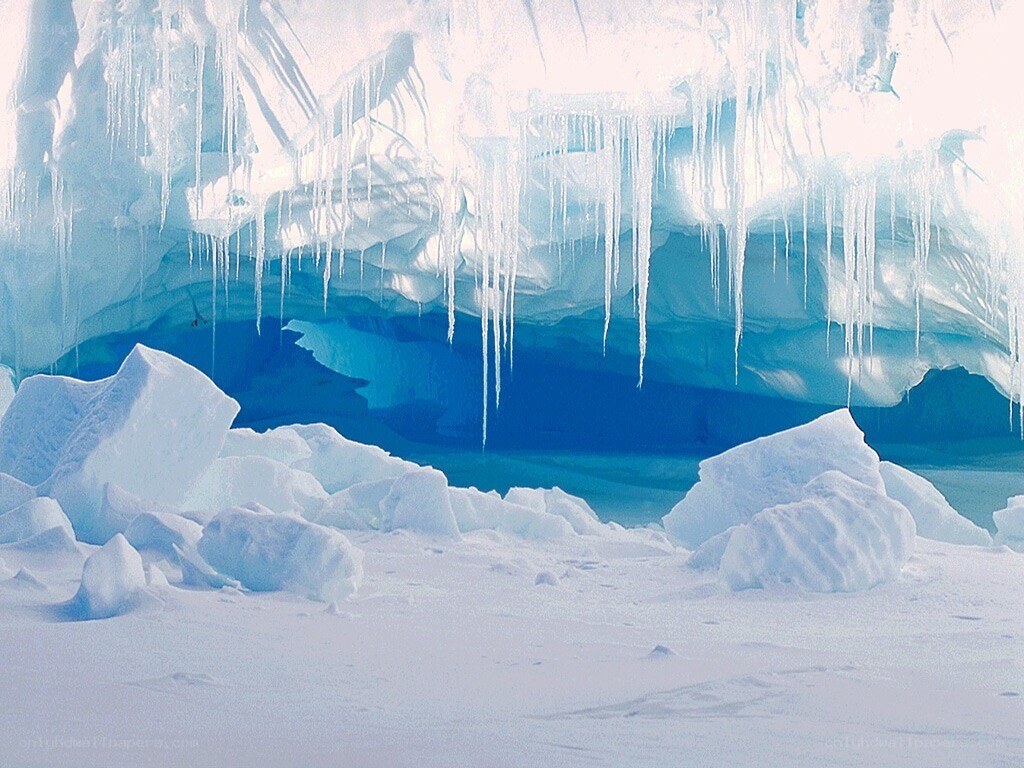 Icy cave with hanging icicles