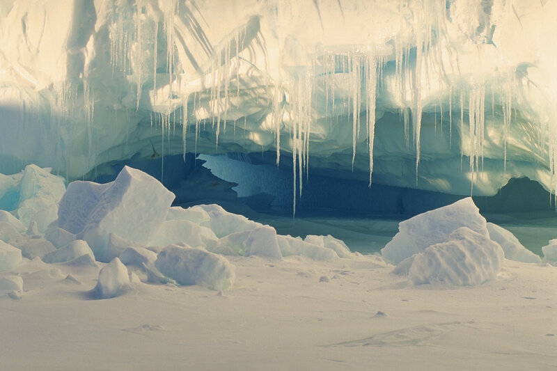 Icy cave with stalactites