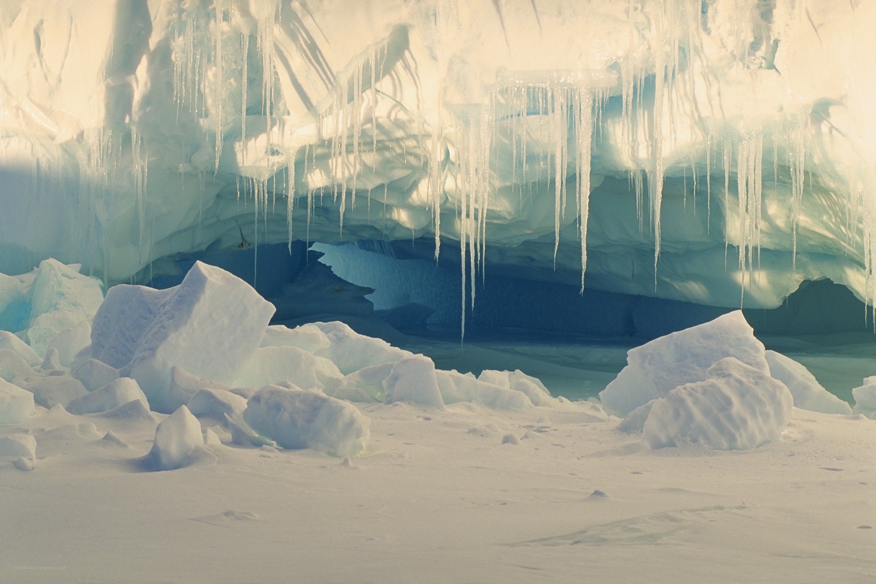 Icy cave with stalactites