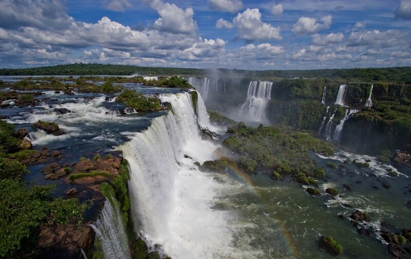 Iguazu Falls Waterfall — Blue, Dramatic, Afternoon, Photograph, Rainbow, Clouds, River
