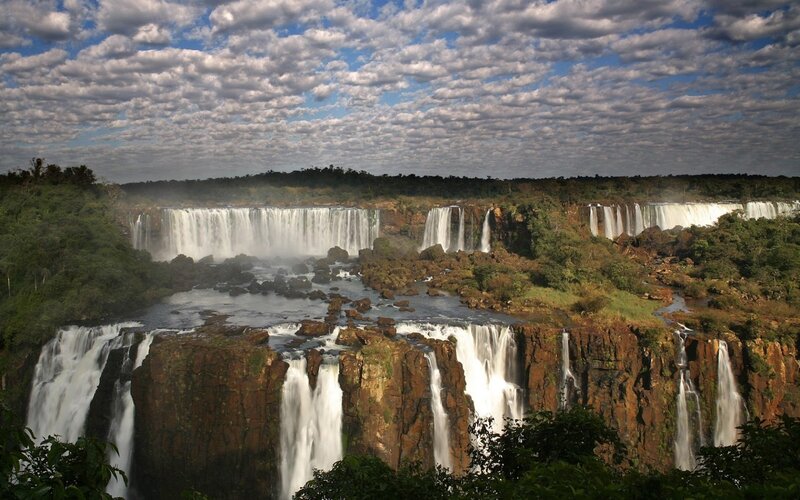 Iguazu Falls Waterfall — Blue, Dramatic, Afternoon, Photograph, River, Cliffs, Trees