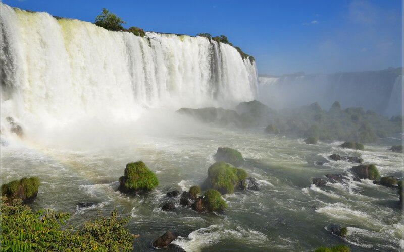 Iguazu Falls Waterfall — Blue, Dramatic, Afternoon, Photograph, River, Rocks, Mist, Green, White