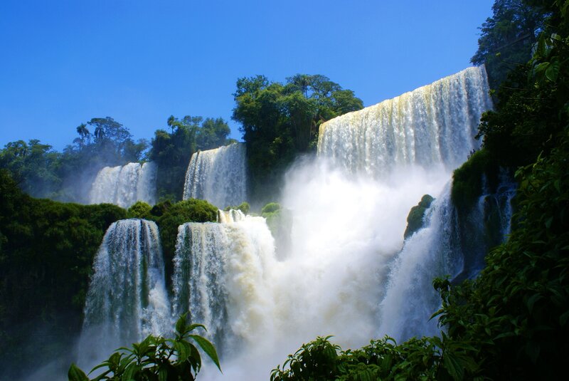 Iguazu Falls Waterfall — Blue, Dramatic, Afternoon, Photograph, Trees, Mist