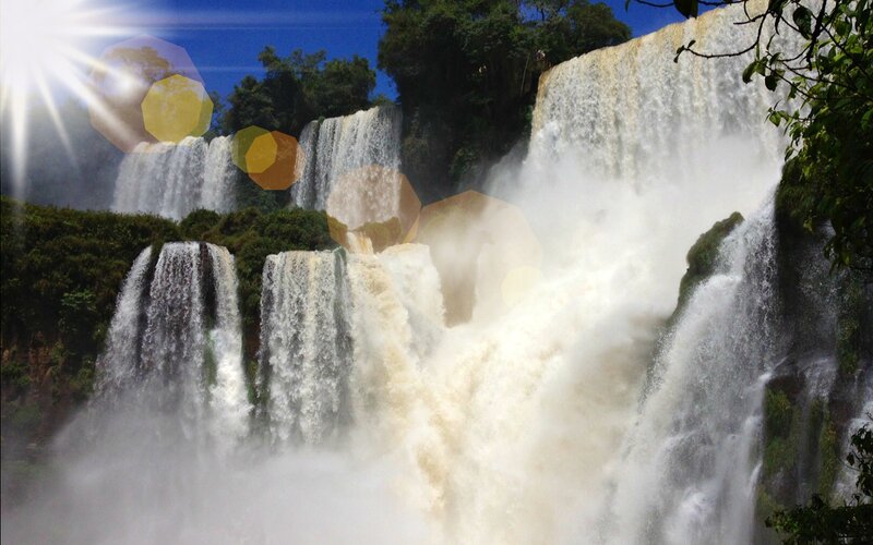 Iguazu Falls Waterfall — Blue, Dramatic, Afternoon, Photograph, Trees, Sunlight