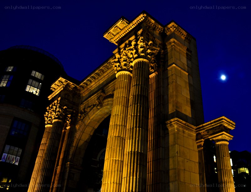 illuminated arch at night