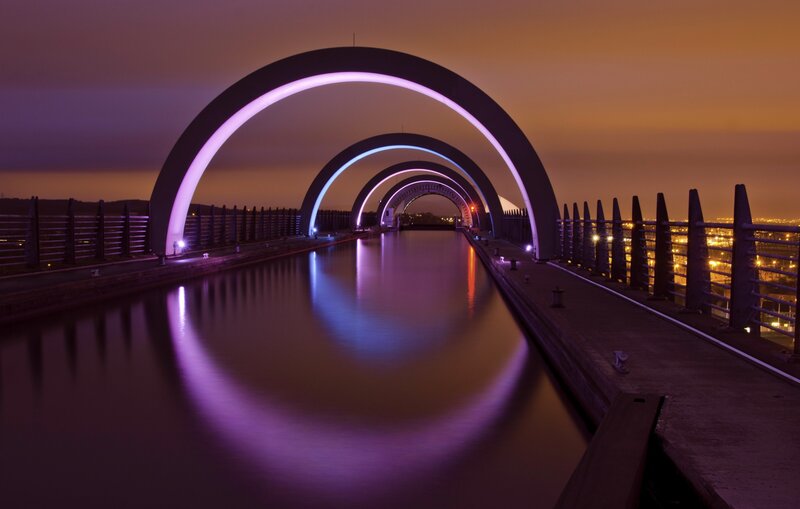 Illuminated Arch Bridge — Purple, Serene, Night