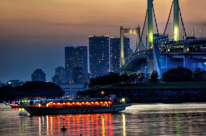 Illuminated Boat on River — Blue