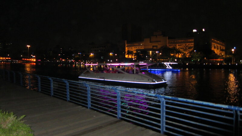 Illuminated Boat on River
